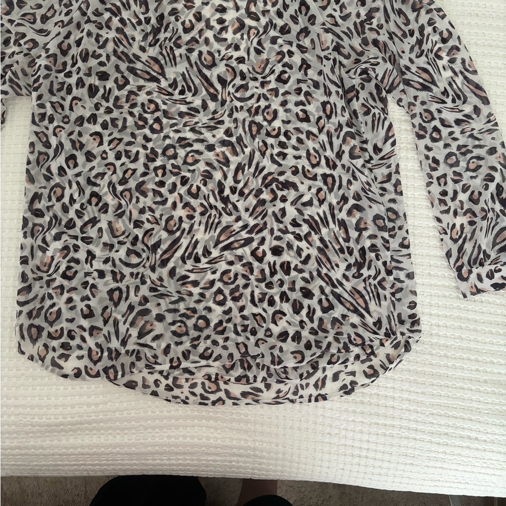 Cabi animal print, long sleeve v-neck top. Beige, black and white.